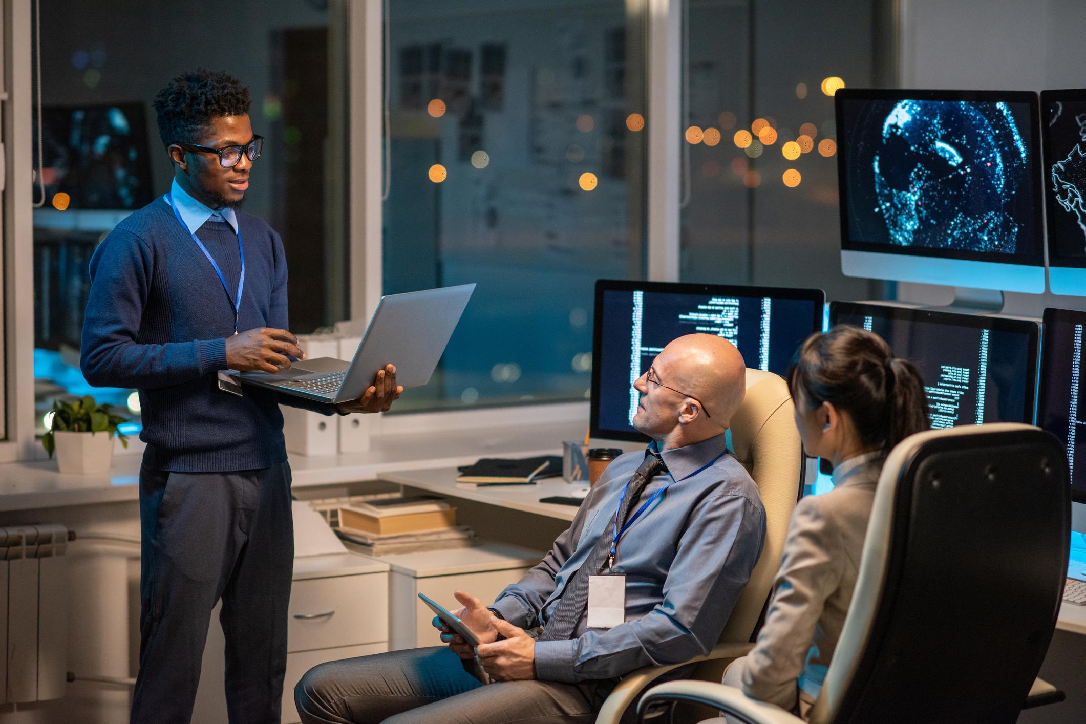 professionals in a computer room